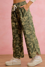 Load image into Gallery viewer, FLORAL PRINTED CURVED SIDE SEAM PANTS WITH DRAWSTRING

